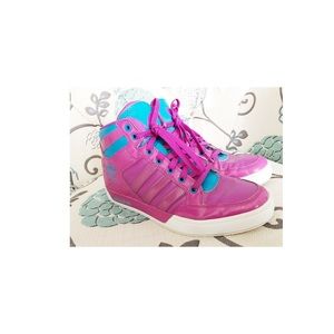 Multicolored women’s Adidas high top sneakers